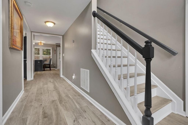 3202 Ivy Station Way, Duluth, GA 30096 - stairs with wood finished floors and baseboards