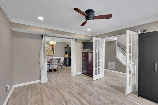 3202 Ivy Station Way, Duluth, GA 30096 - interior space with a ceiling fan, light wood-type flooring, stairs, baseboards, and crown molding
