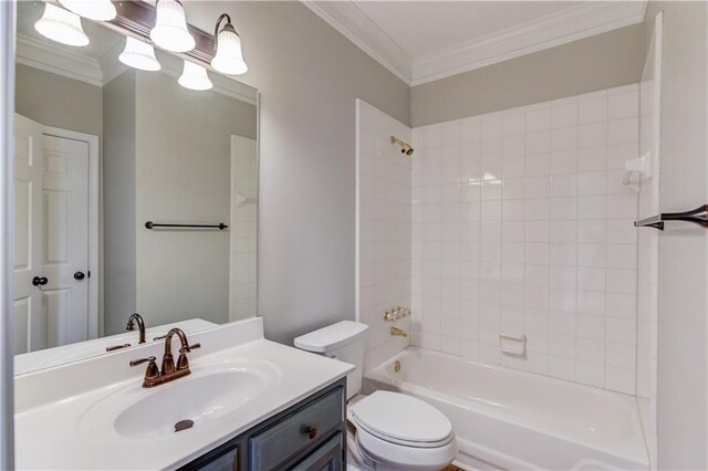 bathroom with shower / tub combination, toilet, vanity, and crown molding