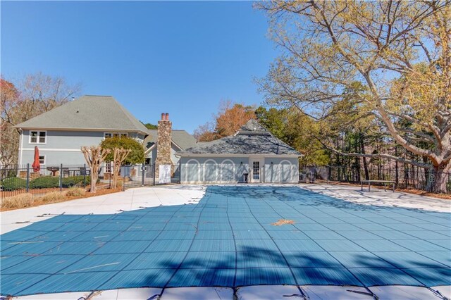 view of pool featuring fence, a fenced in pool, and a patio area
