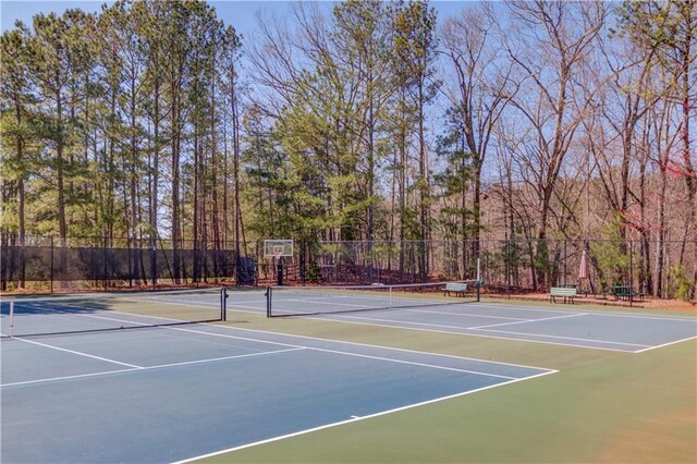 view of sport court with fence and community basketball court