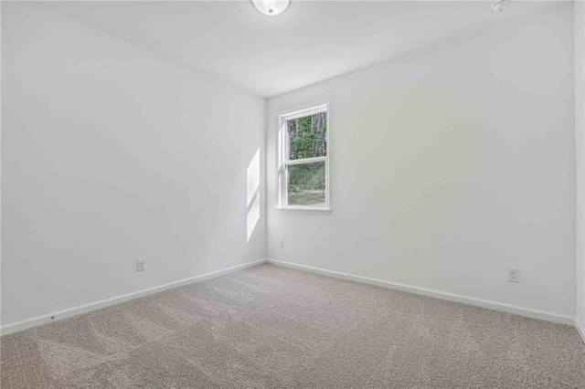 unfurnished room with carpet