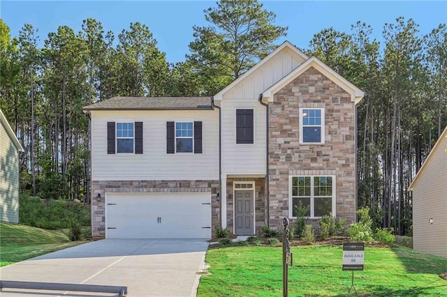 view of front of house with a front lawn and a garage