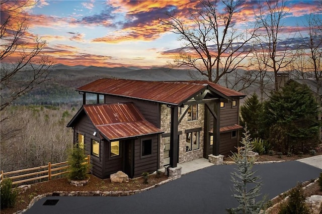 799 Bruce Mountain Rd, Morganton, GA 30560 - view of front of home with stone siding, fence, metal roof, and a mountain view