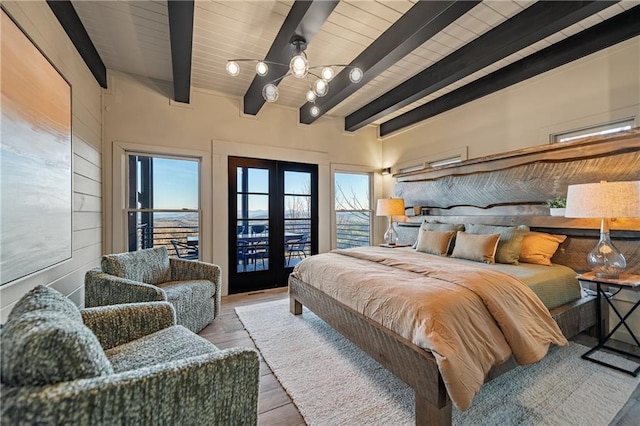 799 Bruce Mountain Rd, Morganton, GA 30560 - bedroom with french doors, beamed ceiling, a chandelier, access to outside, and wood finished floors