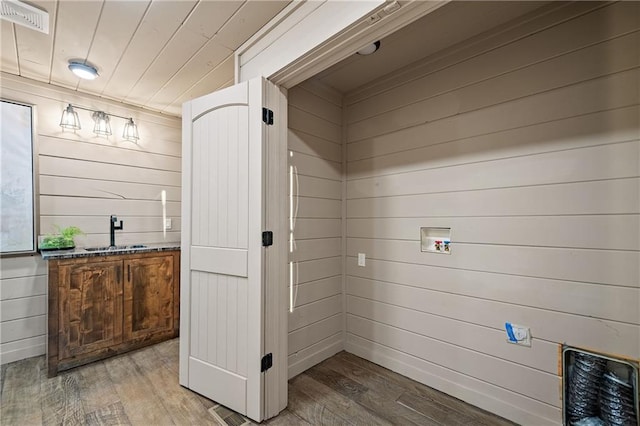 799 Bruce Mountain Rd, Morganton, GA 30560 - laundry area with washer hookup, light wood-type flooring, and wood walls