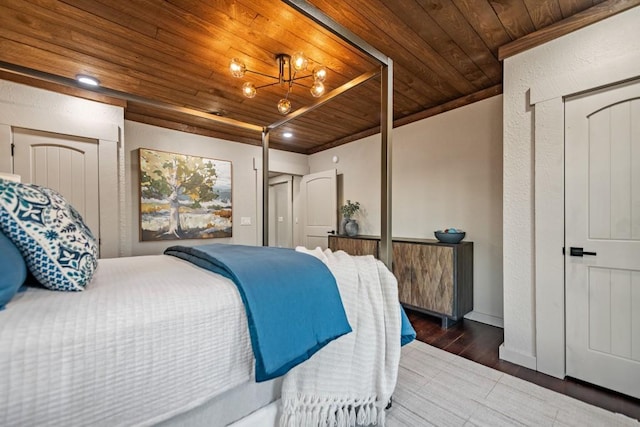 bedroom with wood ceiling and dark hardwood / wood-style floors