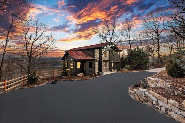 799 Bruce Mountain Rd, Morganton, GA 30560 - view of front of home featuring fence, metal roof, and stone siding