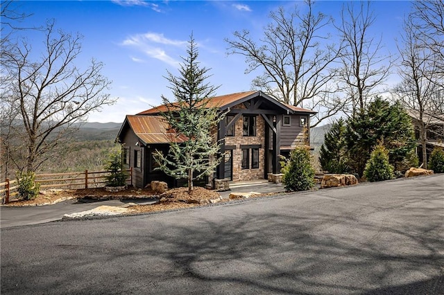 799 Bruce Mountain Rd, Morganton, GA 30560 - rustic home with stone siding, fence, and a mountain view