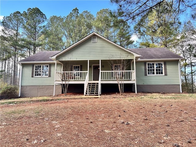 ranch-style house with covered porch