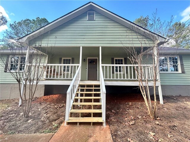 bungalow featuring covered porch