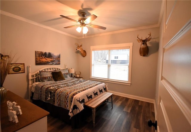 bedroom with dark wood-style floors, a ceiling fan, crown molding, and baseboards