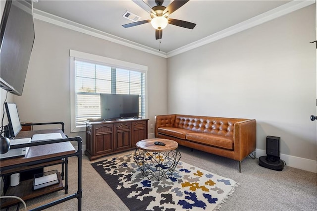 living room featuring ceiling fan, ornamental molding, and light carpet