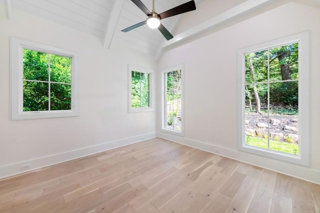 empty room with plenty of natural light, ceiling fan, and light wood-type flooring