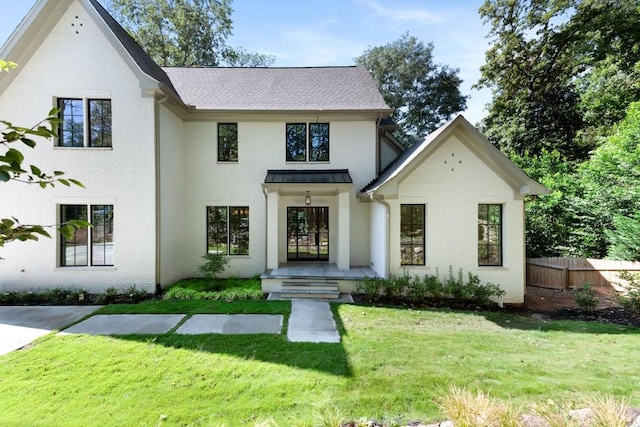 view of front of house with a front lawn