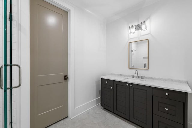 bathroom with vanity, tile patterned flooring, and a shower with door