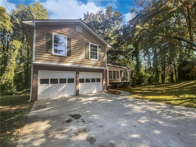 view of property exterior featuring a yard and a garage