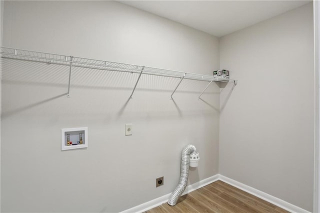 laundry room featuring hardwood / wood-style flooring, hookup for a washing machine, and hookup for an electric dryer