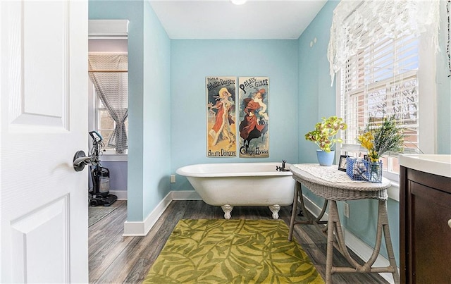 135 E Hill St Unit 24, Decatur, GA 30030 - full bath featuring a freestanding tub and wood finished floors