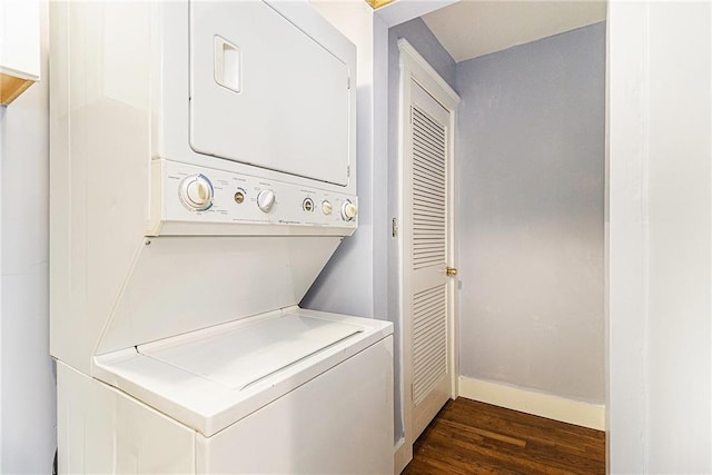 135 E Hill St Unit 24, Decatur, GA 30030 - laundry area featuring estacked washer and dryer and dark wood-type flooring
