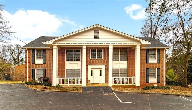 135 E Hill St Unit 24, Decatur, GA 30030 - neoclassical home featuring covered porch and brick siding