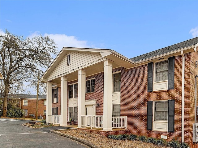 135 E Hill St Unit 24, Decatur, GA 30030 - view of building exterior featuring uncovered parking