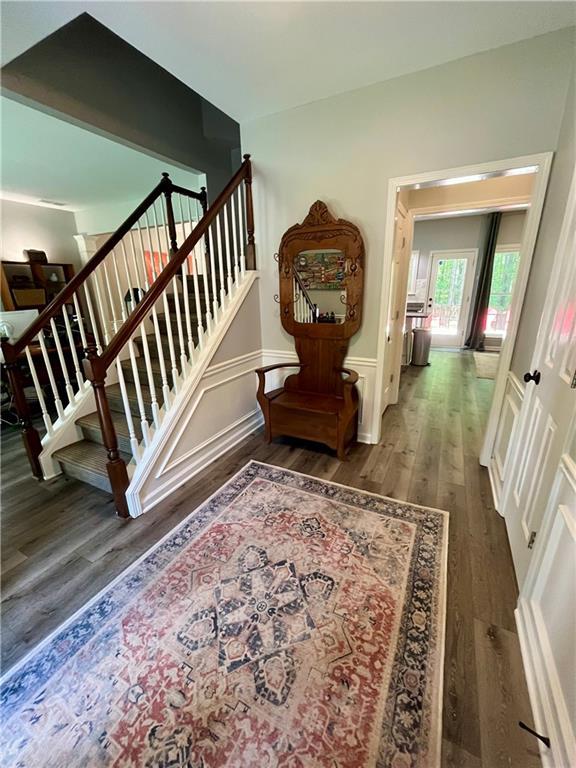2278 Traywick Chase, Alpharetta, GA 30004 - staircase featuring wood finished floors