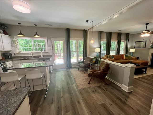 2278 Traywick Chase, Alpharetta, GA 30004 - living area with ceiling fan, visible vents, a healthy amount of sunlight, and dark wood-style floors
