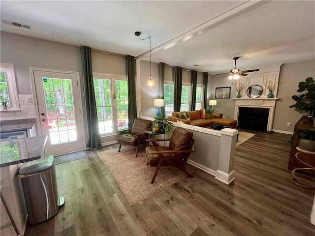 2278 Traywick Chase, Alpharetta, GA 30004 - living area featuring dark wood finished floors, visible vents, a fireplace, and ceiling fan