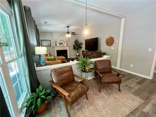 2278 Traywick Chase, Alpharetta, GA 30004 - living area with wood finished floors, visible vents, a fireplace, ceiling fan, and baseboards