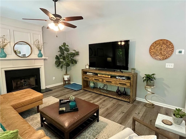 2278 Traywick Chase, Alpharetta, GA 30004 - living room with a ceiling fan, baseboards, a large fireplace, and wood finished floors