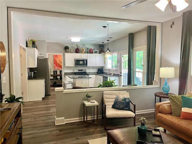 2278 Traywick Chase, Alpharetta, GA 30004 - living area with baseboards, ceiling fan, and dark wood-type flooring