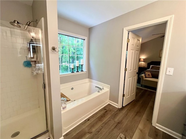 2278 Traywick Chase, Alpharetta, GA 30004 - bathroom featuring a stall shower, ensuite bathroom, a bath, and wood finished floors