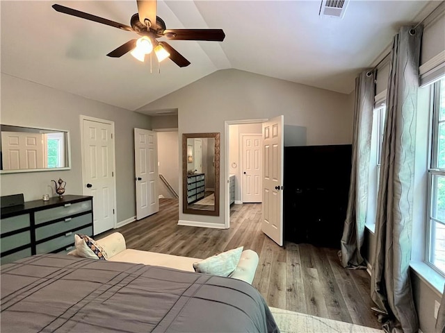 2278 Traywick Chase, Alpharetta, GA 30004 - bedroom featuring vaulted ceiling, visible vents, wood finished floors, and a ceiling fan