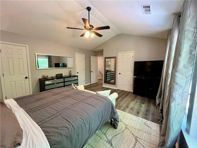 2278 Traywick Chase, Alpharetta, GA 30004 - bedroom with lofted ceiling, wood finished floors, visible vents, a ceiling fan, and baseboards