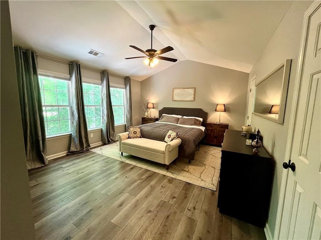 2278 Traywick Chase, Alpharetta, GA 30004 - bedroom featuring wood finished floors, visible vents, vaulted ceiling, a ceiling fan, and baseboards