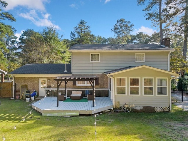 rear view of house with fence, a wooden deck, outdoor lounge area, a pergola, and brick siding