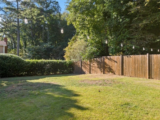 view of yard featuring fence