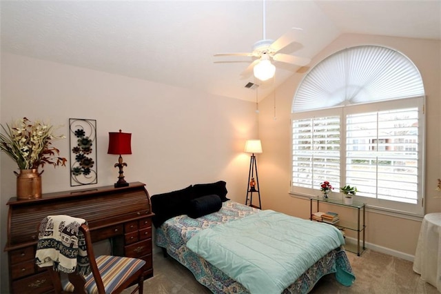 bedroom featuring visible vents, baseboards, carpet flooring, lofted ceiling, and ceiling fan