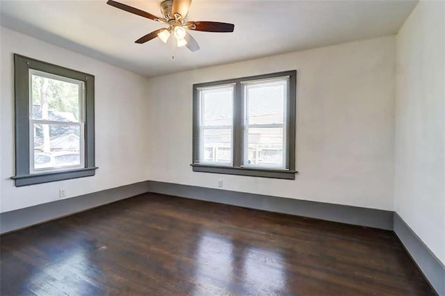 1497 Rogers Ave, Atlanta, GA 30310 - empty room with dark wood-style flooring and ceiling fan