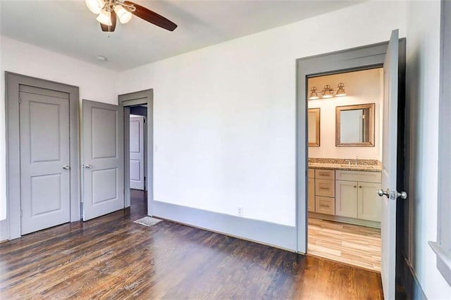 1497 Rogers Ave, Atlanta, GA 30310 - unfurnished bedroom with wood finished floors and ensuite bath