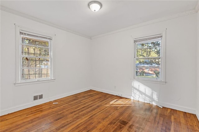 2081 Dodson Dr SW, Atlanta, GA 30311 - spare room with plenty of natural light, hardwood / wood-style floors, ornamental molding, and baseboards