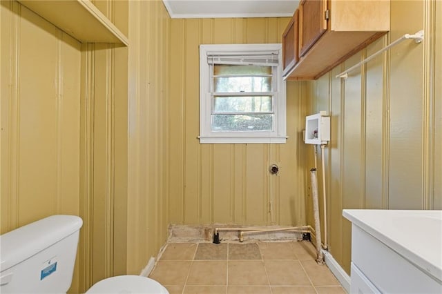 2081 Dodson Dr SW, Atlanta, GA 30311 - bathroom with toilet, tile patterned floors, and vanity