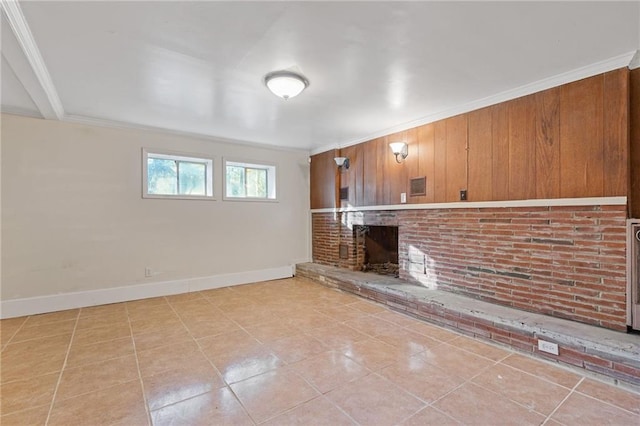 2081 Dodson Dr SW, Atlanta, GA 30311 - unfurnished living room with a brick fireplace, baseboards, crown molding, and tile patterned flooring