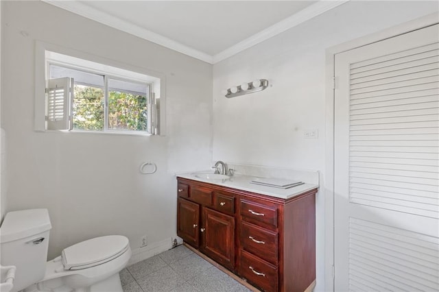 2081 Dodson Dr SW, Atlanta, GA 30311 - half bath featuring toilet, ornamental molding, vanity, and baseboards