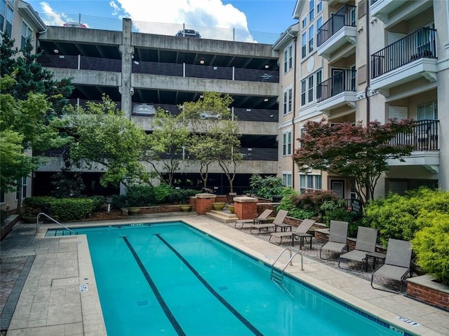 community pool with a patio
