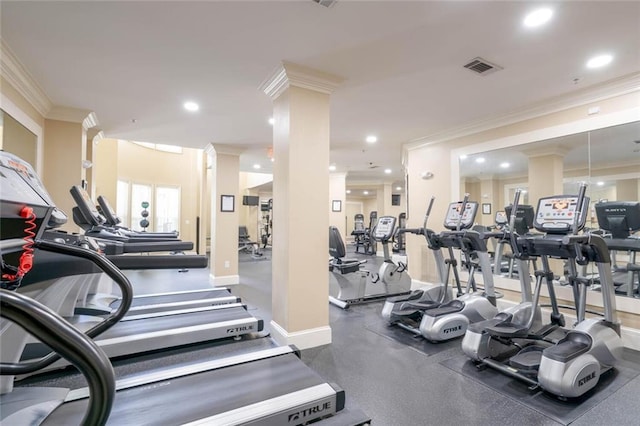 exercise room featuring crown molding, recessed lighting, and baseboards