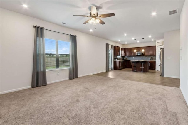 1130 Lyndhurst Ln, Bethlehem, GA 30620 - living room with light carpet, ceiling fan, and recessed lighting