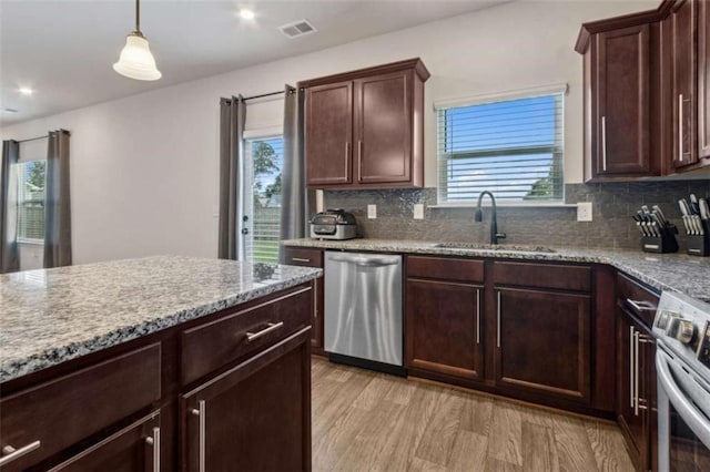 1130 Lyndhurst Ln, Bethlehem, GA 30620 - kitchen with stainless steel appliances, backsplash, healthy amount of natural light, and recessed lighting