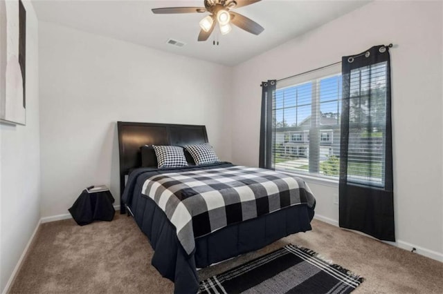 1130 Lyndhurst Ln, Bethlehem, GA 30620 - carpeted bedroom featuring baseboards and a ceiling fan